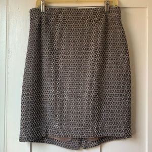 The Pencil Skirt by J Crew in a melange wool blend tweed speckled with bronze.